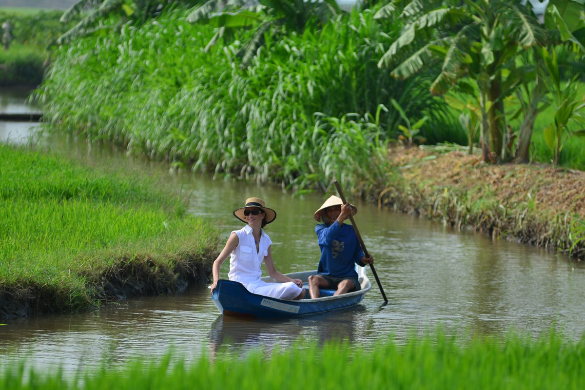 Guest taking a rowing boat to visit the local village