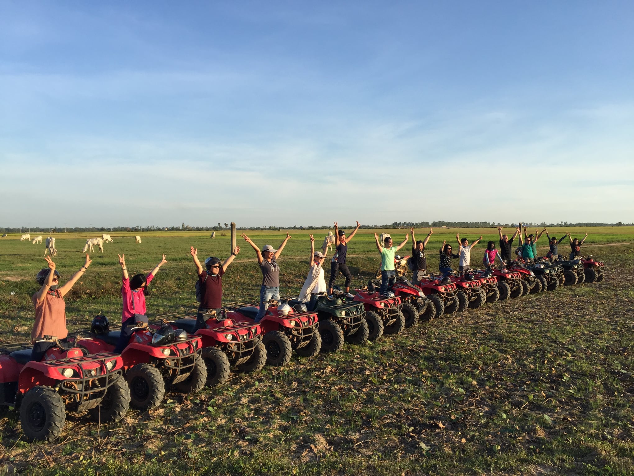 group enjoying riding quad bikes in siem reap