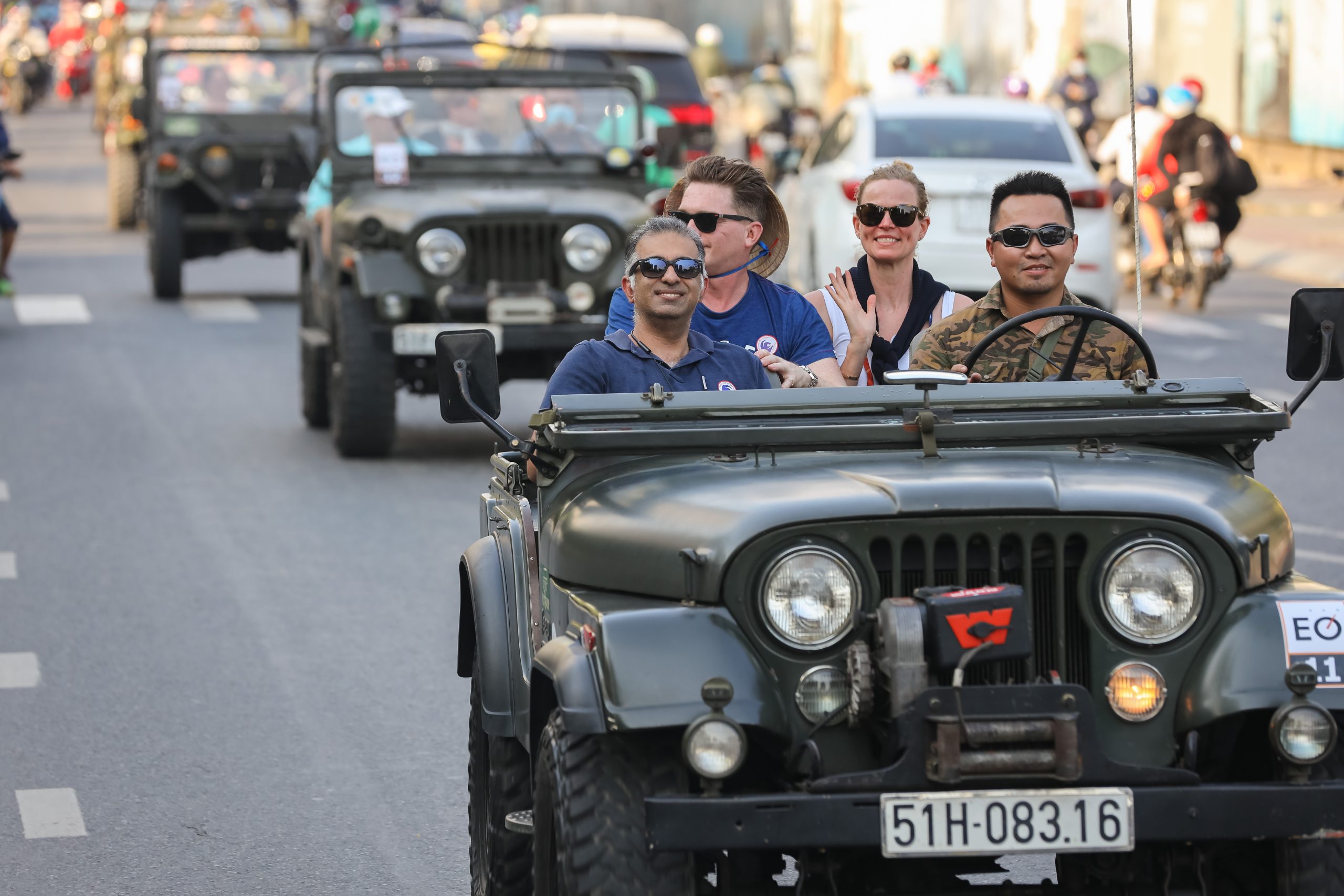 Guests are taking Jeep tour in Saigon