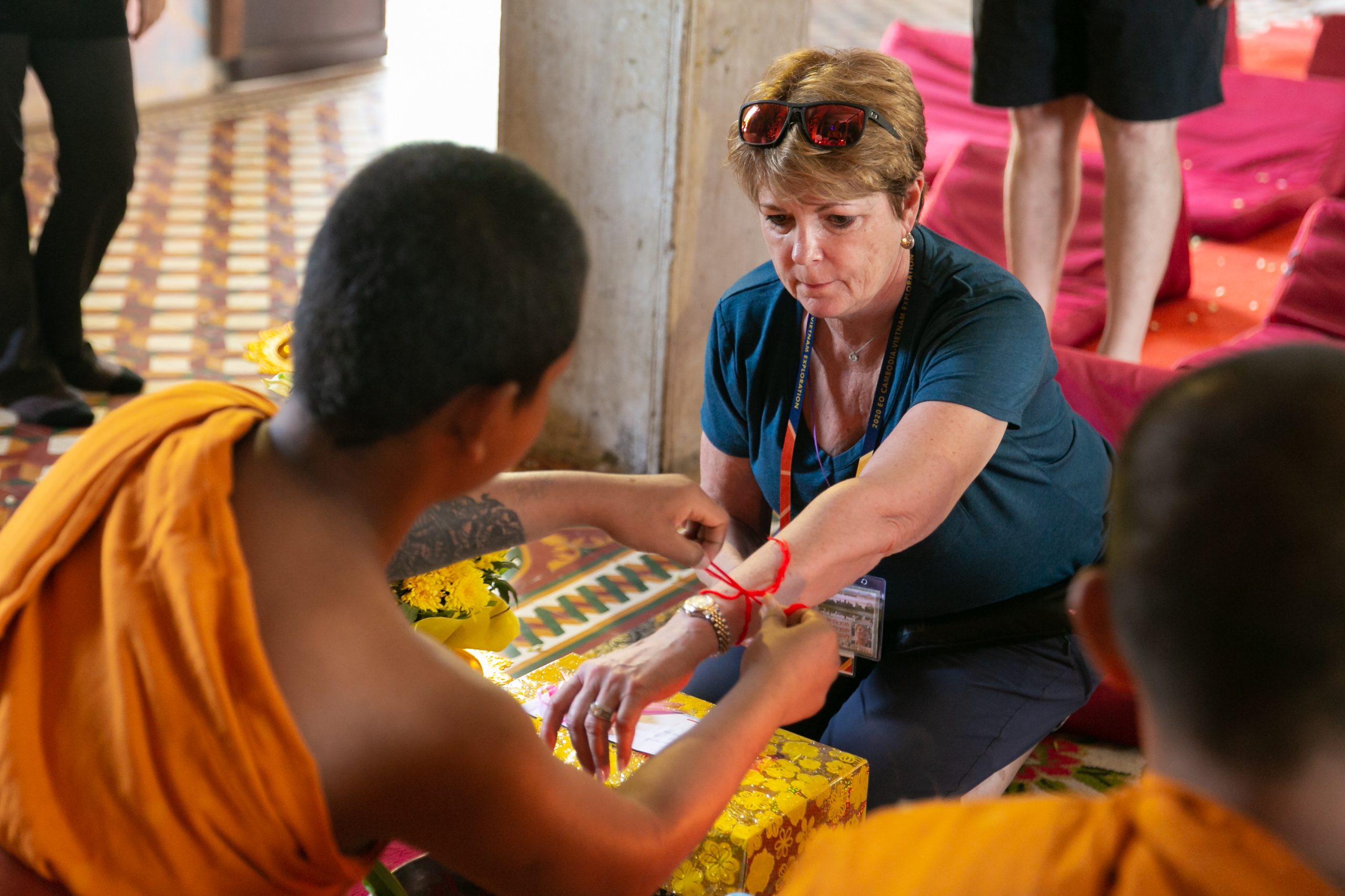 guest is having a monk-blessing in cambodia