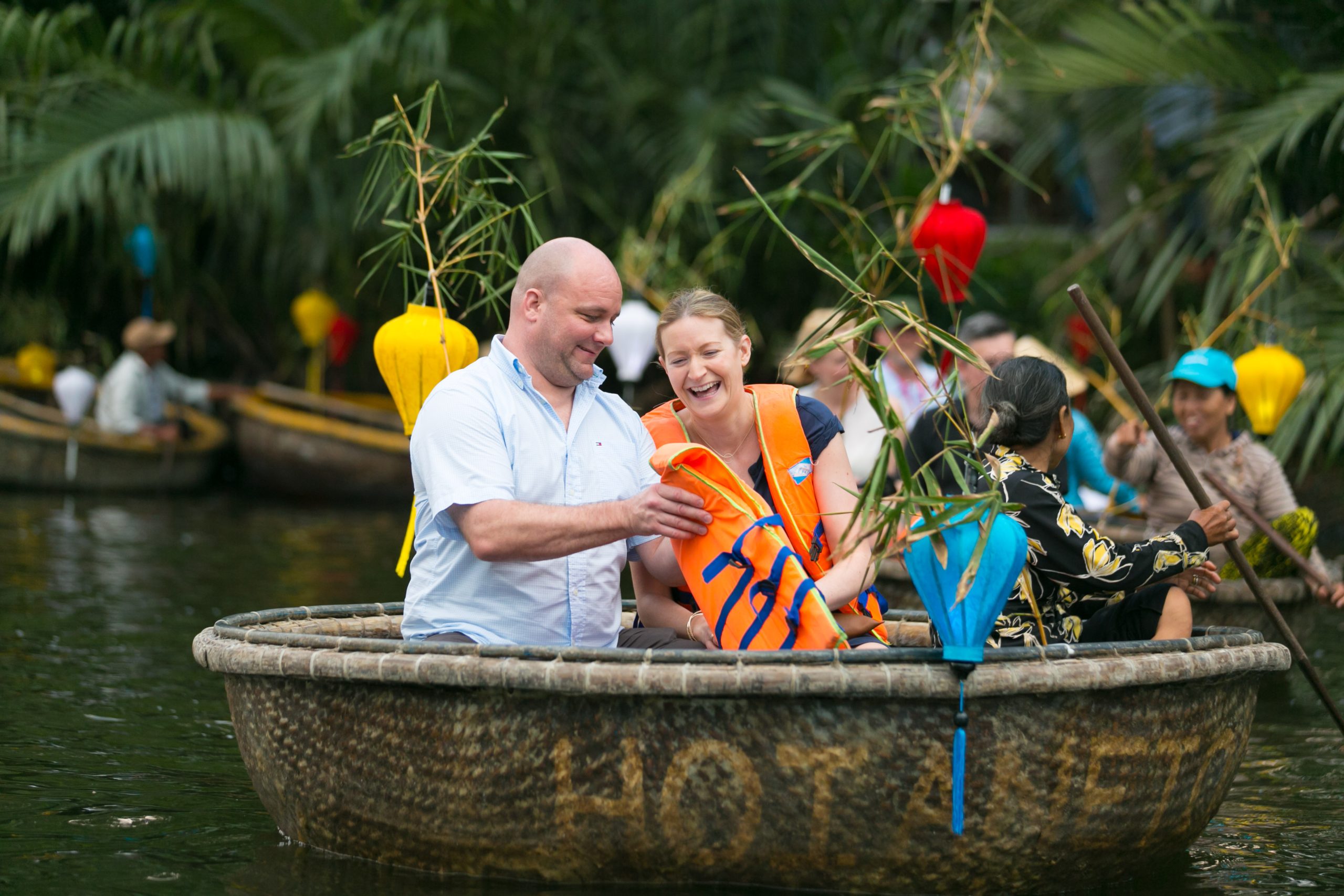 Guests enjoying basket boat rowing in Hoi an