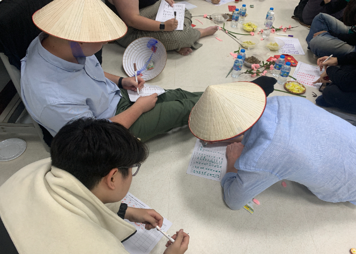 Students are writing their thought of the whole program in Vietnam