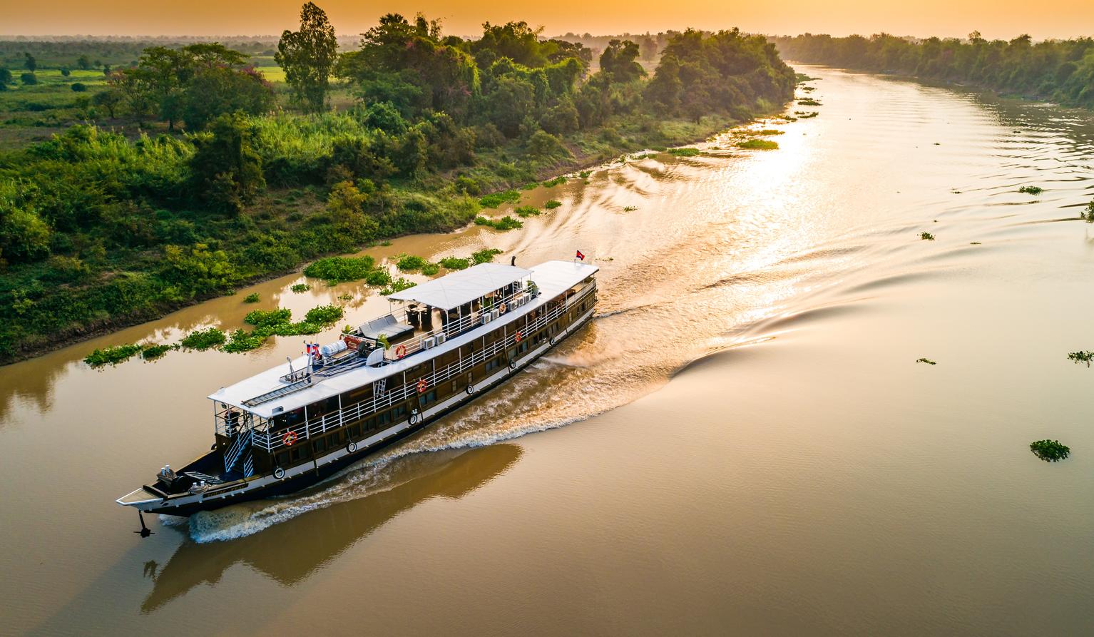 A boat cruising along the river
