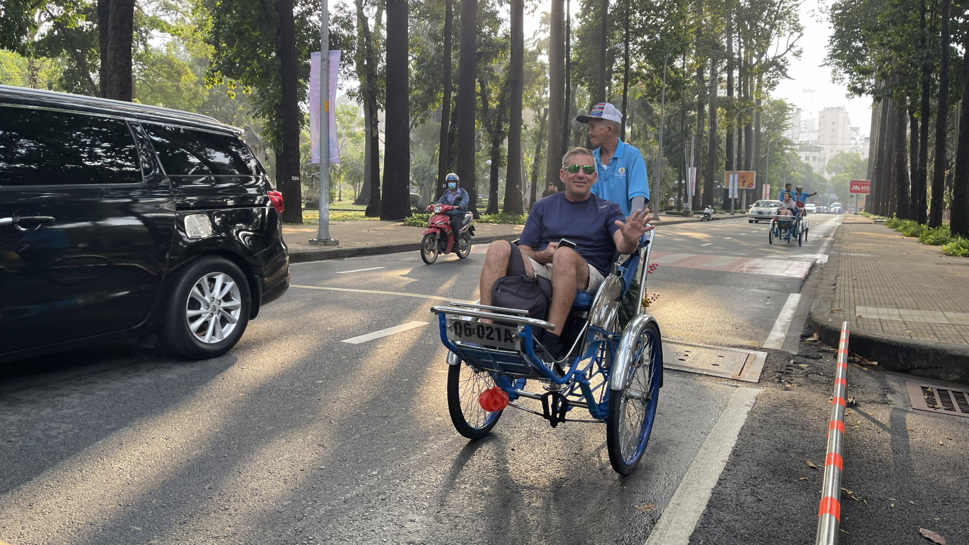Good Morning Saigon 10 Guest is taking the early morning ride by cyclo