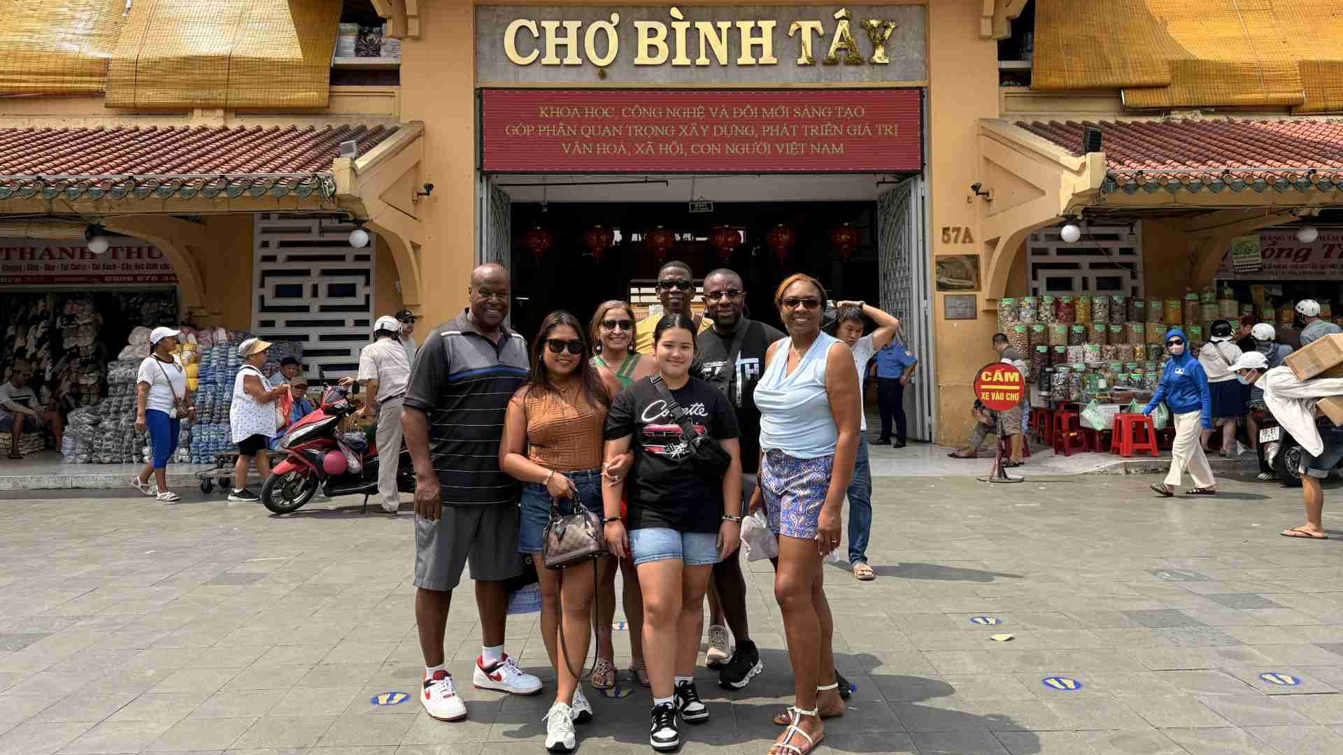 Guests visiting Binh Tay market